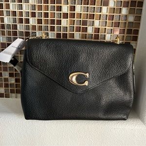 Brand new black coach bag with tags